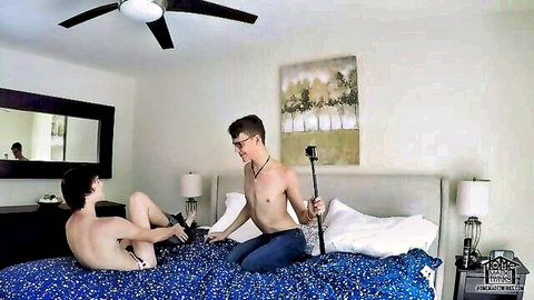 Two twinks filming their nude bedroom fun with selfie stick