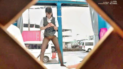 Japanese woman in uniform flashing shaved pussy outdoors in stockings