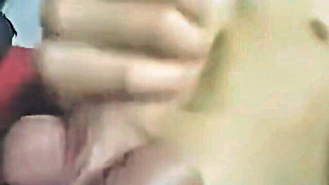 Amateur gangbang scene with multiple men surrounding a pale woman in doggy style penetration