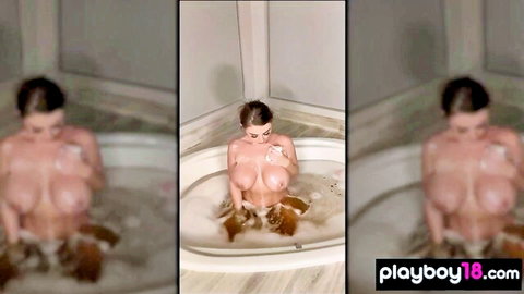 Busty brunette milf taking a nude bath and masturbating solo