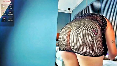 Sexy girl in sparkly mesh dress showing her amazing big ass