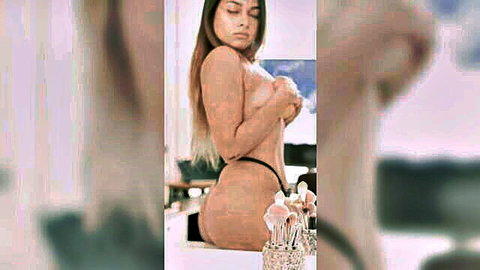 Desi Indian woman with big curvy ass in black thong, posing nude in bathroom mirror
