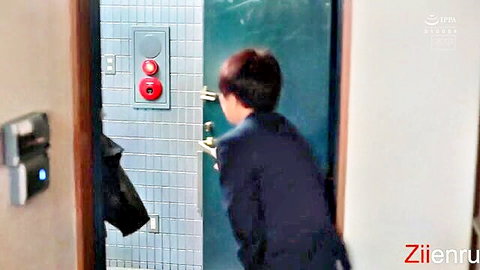 Asian stepson in suit entering bathroom door in seduction scene