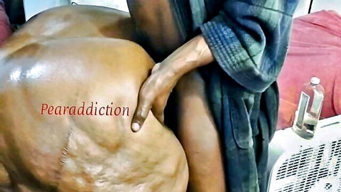 Ebony man's massive oiled ass grabbed firmly from behind in doggy style