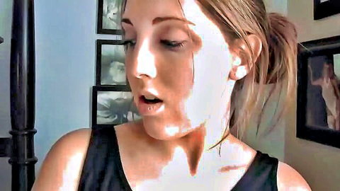 Blonde babe opens mouth wide teasing blowjob in tight black tank top