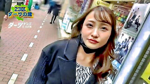 Japanese woman in black coat and mask on urban street, seductive gaze