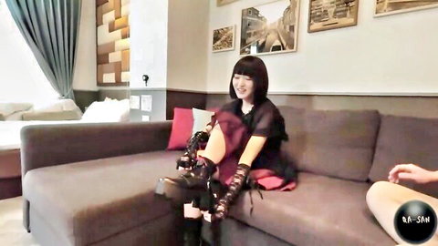 Petite Japanese babe in sheer lingerie spreads legs wide for intense crotch fingering on couch