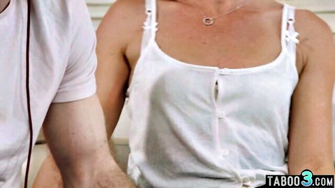 Stepmom in white tank top distracting stepson with seductive pose