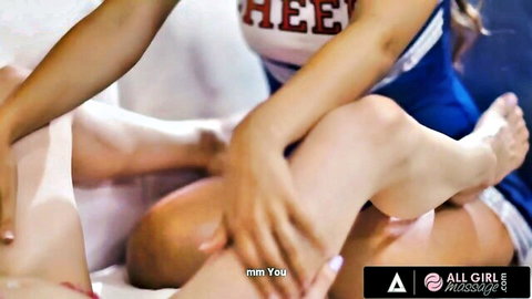 Horny college cheerleaders in uniform during steamy all-girl massage session