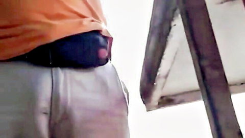 Straight daddy showing massive bulge in gray sweatpants