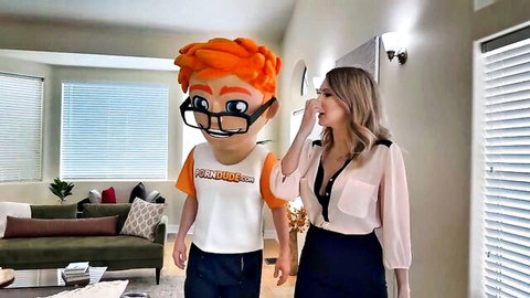 Gigi Dior in sheer blouse and skirt posing with Pornhub mascot