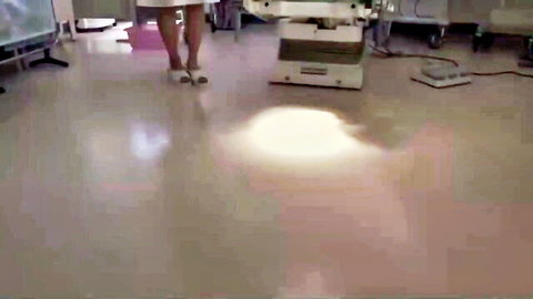 Angelina Castro in short white dress and pink high heels, curvy Latina pose