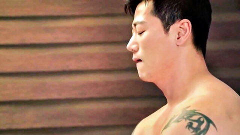 Shirtless tattooed Korean man in profile, erotic adult video thumbnail