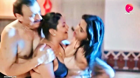 Older Indian man gropes curvy MILF tits in black bra while long-haired babe in beige bra presses close in sensual threesome