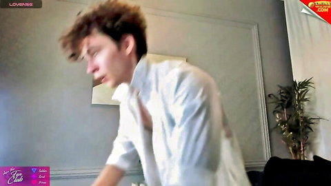 Young twink camboy in open white shirt seductive webcam tease