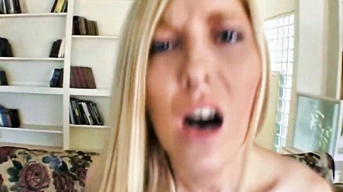 Blonde babe with wide-open mouth moaning intensely during blowjob, bare shoulders visible