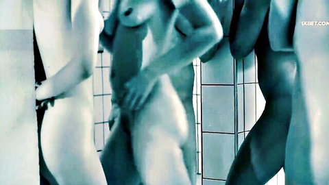 Brunette women in steamy hardcore shower embrace, nude bodies touching intimately