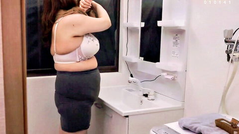 Amamiya Soyogi in white lacy bra and gray skirt, curvy erotic pose