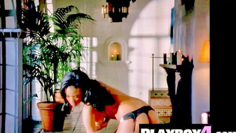 Sasha ebony cougar with huge melons posing topless in lingerie