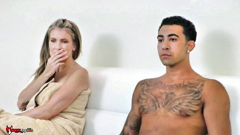 Shocked blonde MILF in towel stares at tattooed hunk's bare chest on casting couch