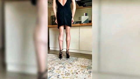 Seductive woman in black open-back dress and heels, rear view tease