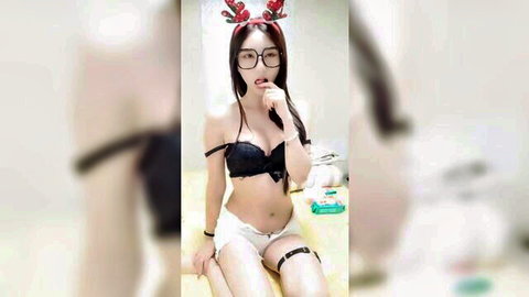 Japanese streamer in reindeer lingerie teasing with finger bite