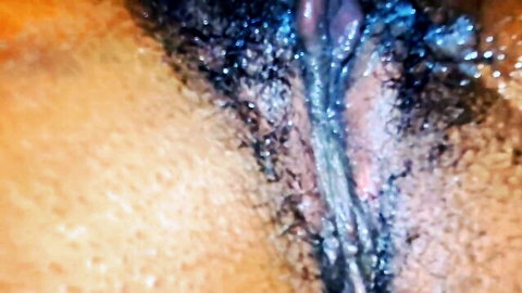 Close-up of stepmom eating stepdaughter's wet pussy in lesbian incest porn