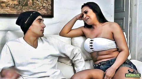 Alessandra Marques, Brazilian beauty in tube top and shorts, flirty couch chat