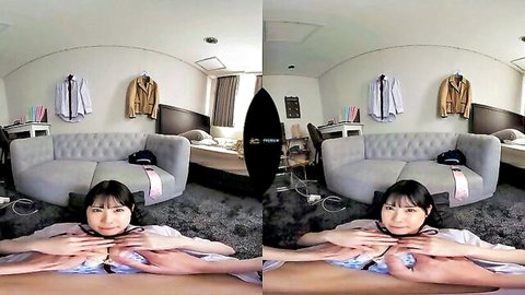 Japanese babe squeezes her perky tits together topless on bedroom floor POV