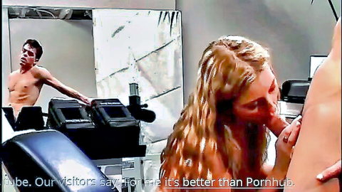 Busty blonde babe sucks muscular guy's cock on gym bench with mirror view
