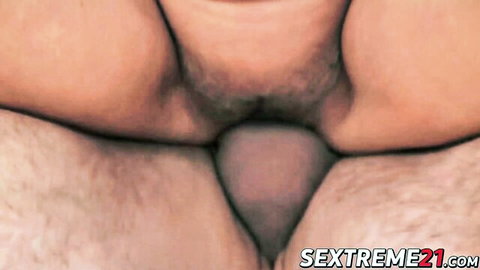 Close-up of thick cock penetrating hairy wet pussy with spread labia