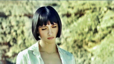 Lera Abova seductive in open white shirt, cleavage reveal, beach vibe