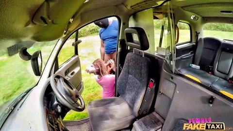 Brooke Jameson bent over in pink dress in steamy fake taxi cab