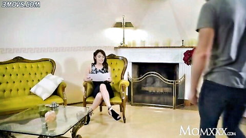 Dominica Phoenix as hot Russian MILF in elegant skirt and blouse on sofa