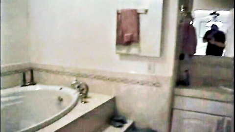 Stunning big-boobed trans woman in bathroom mirror reflection