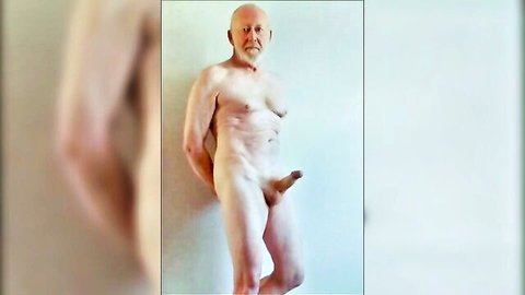 Bald grandpa with beard showing erect cock in nude solo pose