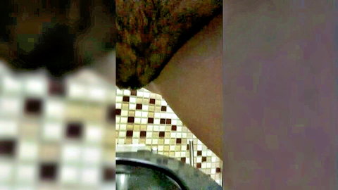 Angel in tight jeans peeing in mall bathroom, voyeur style