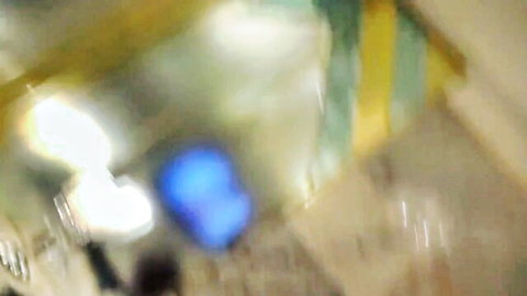 Blurry amateur Japanese woman in yellow lingerie posing indoors