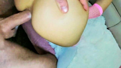 Man fingers shaved pussy and inserts purple dildo into woman's ass in amateur car doggy style