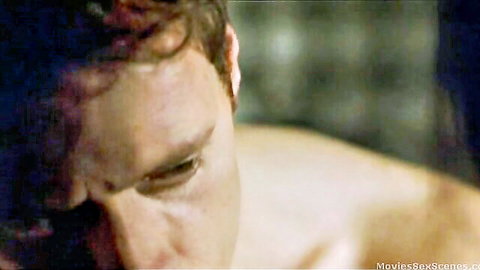 Close-up of intense shirtless man with reddish hair from Amorestremo 2001