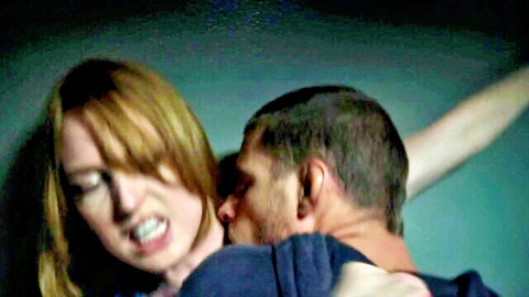 Alicia Witt intense close-up embrace with man in Kingdom scene