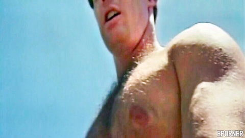 Muscular shirtless man with hairy chest and open mouth in outdoor vintage porn scene