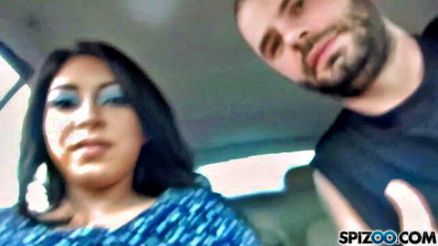 Brunette Latina babe and bearded stud posing close in car selfie