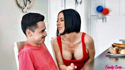 Busty Latina in red dress flirts with young guy at family swap BBQ