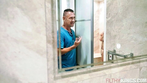 Dani Valentina teases big tits in shower, man peeks in to help wash