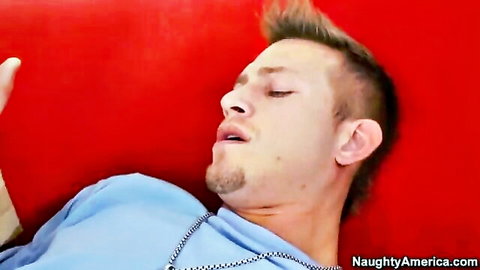 Man in ecstasy lying back during Sarah Vandella's steamy living room encounter