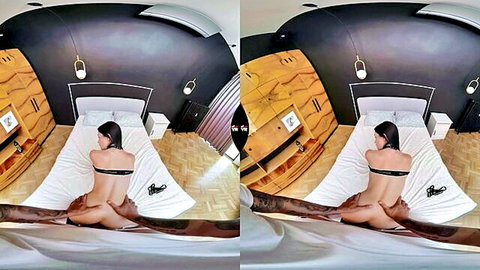 Bound brunette babe lies naked on bed spreading her bare ass in VR POV