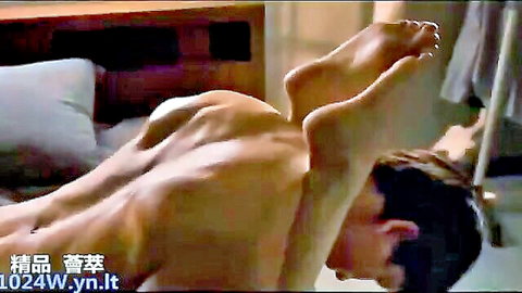 Muscular Korean man nude on bed legs raised high exposing tight ass and hard cock