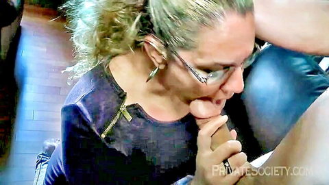 Blonde woman with glasses sucks thick cock passionately in closeup blowjob