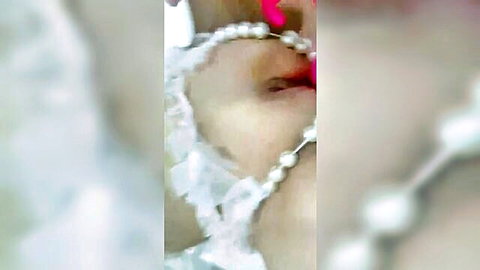 POV closeup of bride in lace veil with pearl necklace giving sloppy blowjob